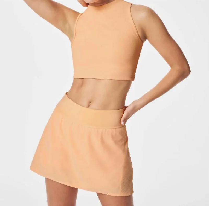 Get Moving Rib Mock Neck Crop Top In Melon